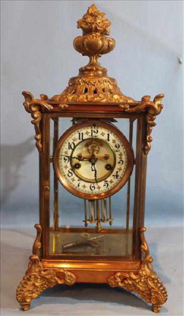 Avignon crystal regulator clock in rich plated gold, 18: Avignon crystal regulator clock in rich plated gold, 18 in. T, 8 in W, 7 in. D.