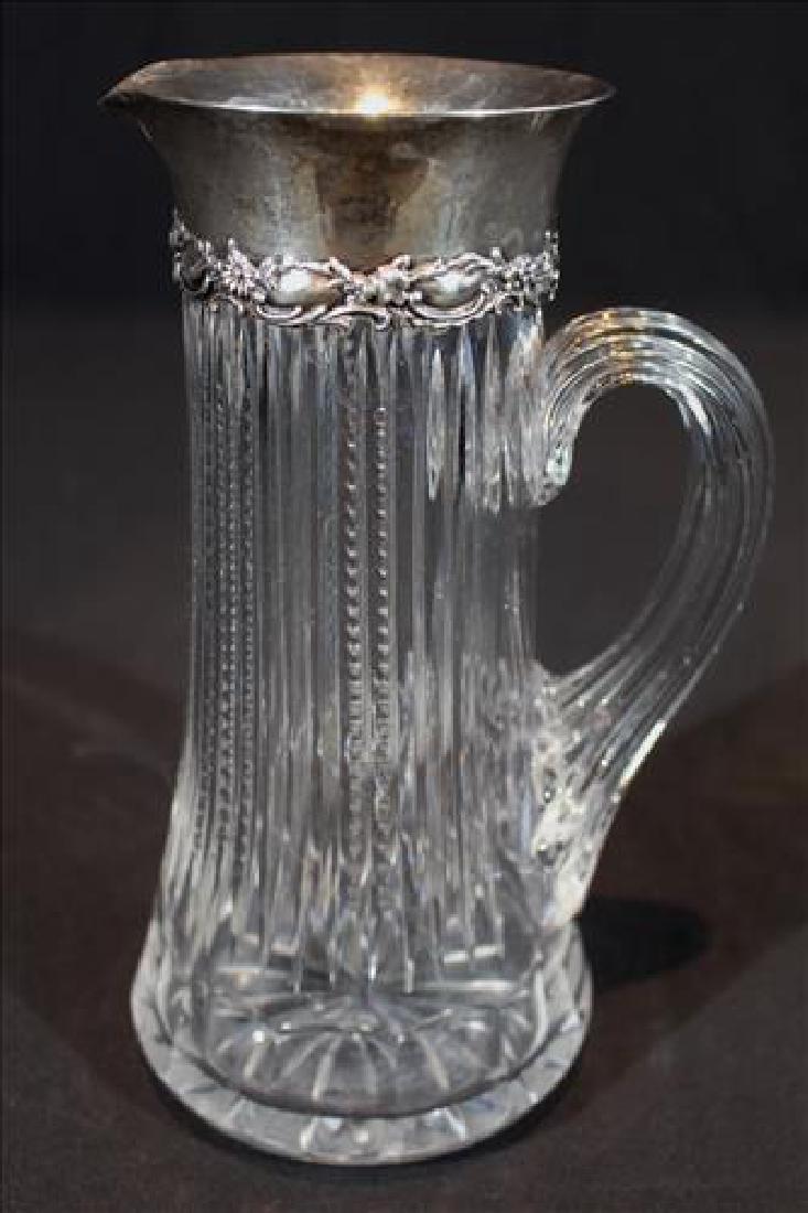 Brilliant cut glass water pitcher with sterling rim (1 of 3)