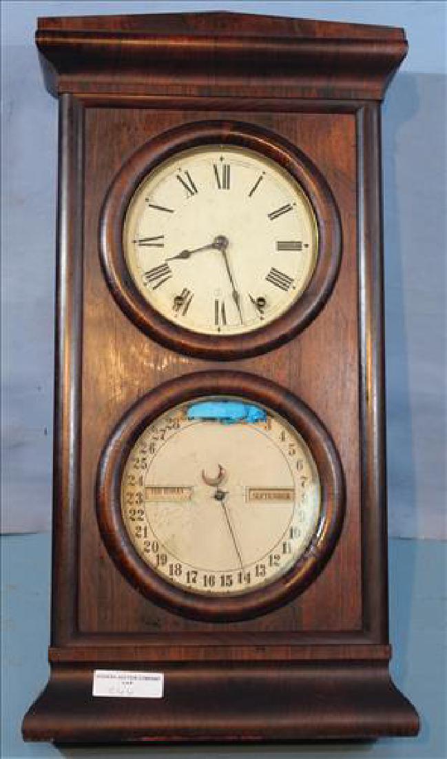 Mahogany Seth Thomas calendar clock with pendulum