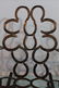 Folk art metal rocker made of black horse shoes - 2