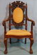 Oak heavily carved parlor chair with grapes on back