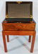 Rosewood lap desk on stand with original ink bottles