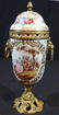 Hand painted Sevres porcelain caped urn, signed