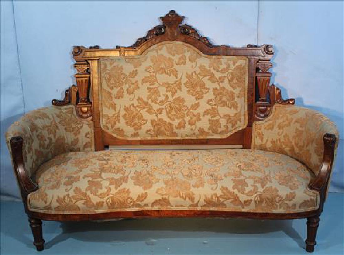 Walnut renaissance parlor sofa with blue and brown: Walnut renaissance parlor sofa with blue and brown upholstery, 44 in. T, 55 in. W, 22 in. D.