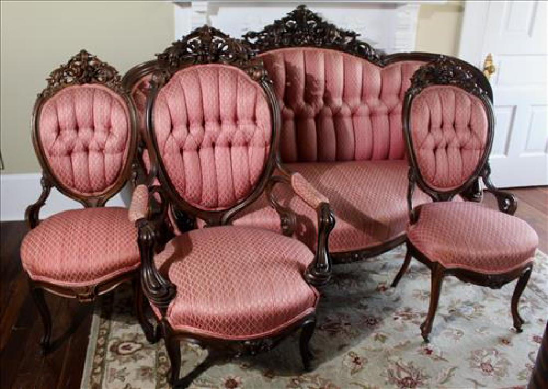 Rosewood rococo 4 piece parlor suit by Meeks: Rosewood rococo heavily carved 4 piece parlor suit attrib. to Meeks, 46 in. T, 70 in. W, 24 in. D.
