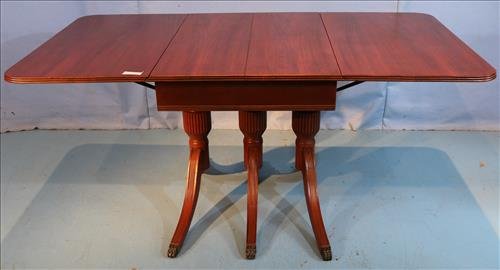 Mahogany Duncan Phyfe dining table w reeded column: Mahogany Duncan Phyfe dining table with reeded column support, 3 pedestals, drop leaf and extra leaves, 30 in. T, 38 in. D, 53 in. L.