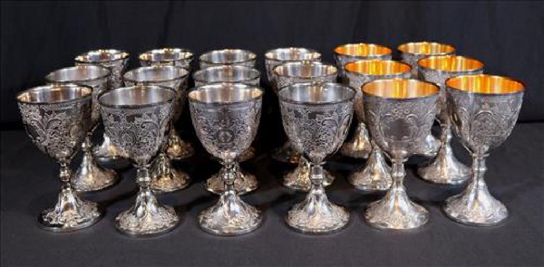 Set of 18 silver-plate wine chalices, 6 with gold wash: Set of 18 very heavy silver-plate wine chalices, 6 with gold wash inside, 7 in. T.