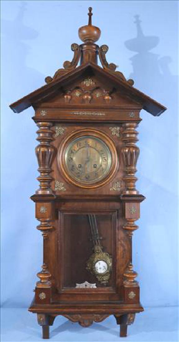 Walnut Victorian wall clock with faces and pendulum (1 of 5)