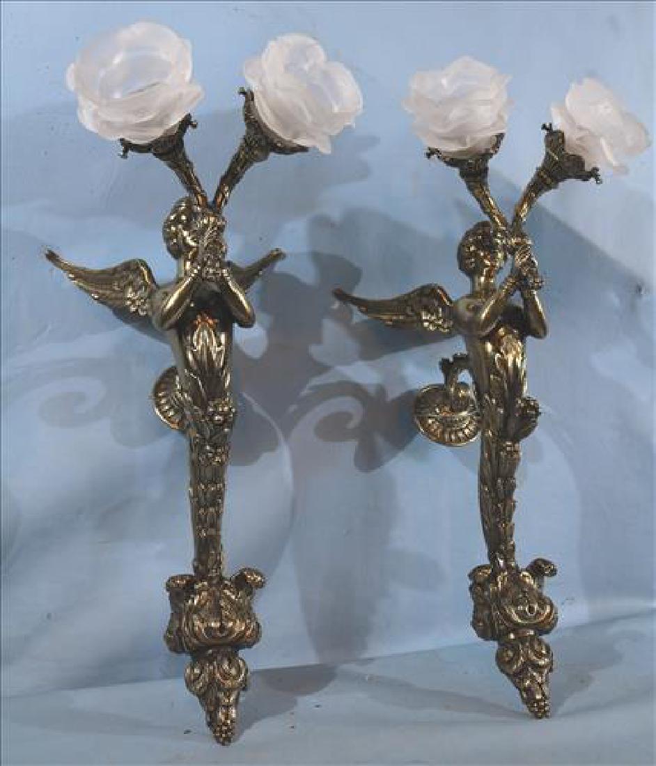 Pair brass wall sconces of winged cupid holding 2 (1 of 4)