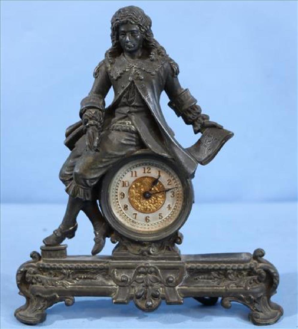 Small metal desk clock with statue of Shakespeare, 8.5: Small metal desk clock with statue of Shakespeare, 8.5 in. T, 7 in. W.