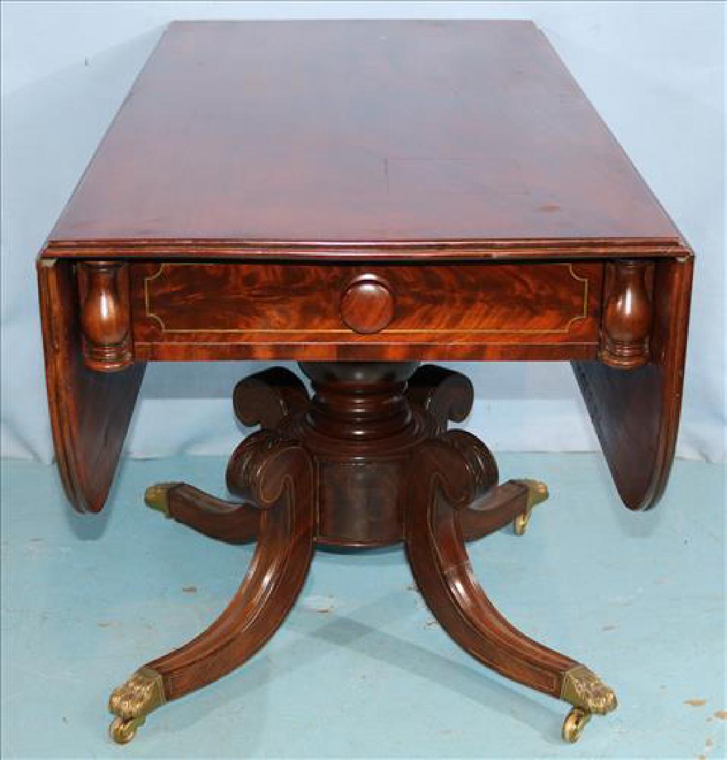 Drop leaf mahogany breakfast table, 48 in. L.