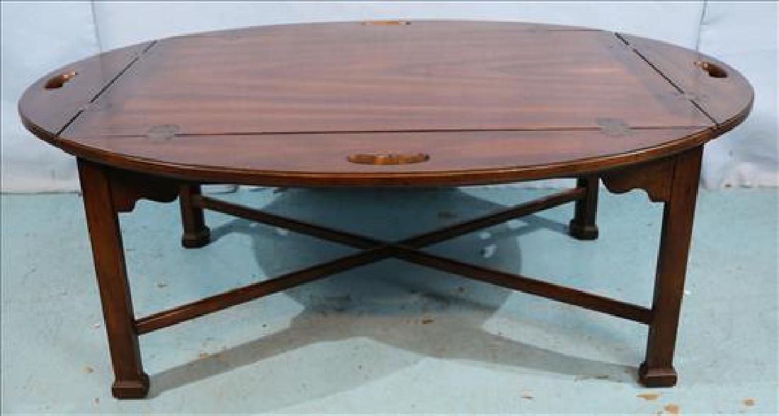 Mahogany butlers serving table signed Heritage: Mahogany butlers serving table signed Heritage, 16 in. T, 25 in. W, 34 in. D.