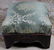 Empire mahogany footstool with green upholstery