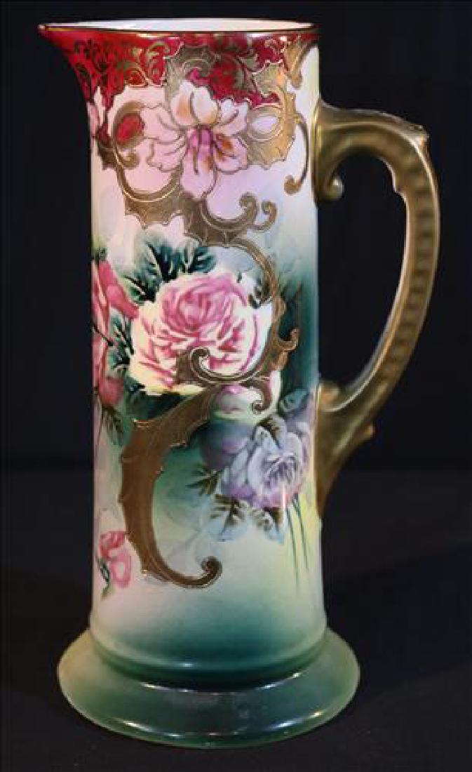 H.P. Nippon tankard with painted flowers, 12 in. T.: H.P. Nippon tankard with flowers painted in green and maroon and gold pain, 12 in. T.