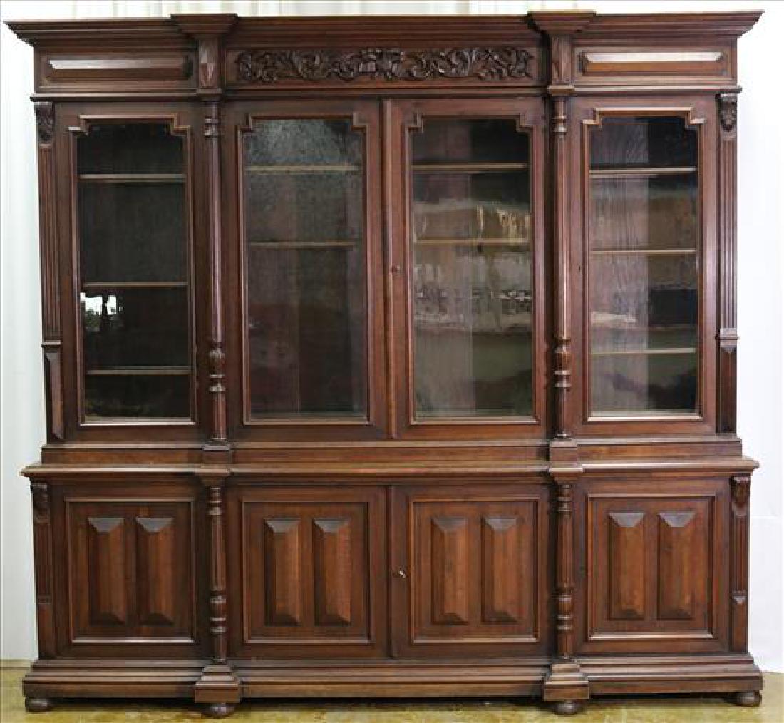 Oversize oak bookcase with original glass and finish