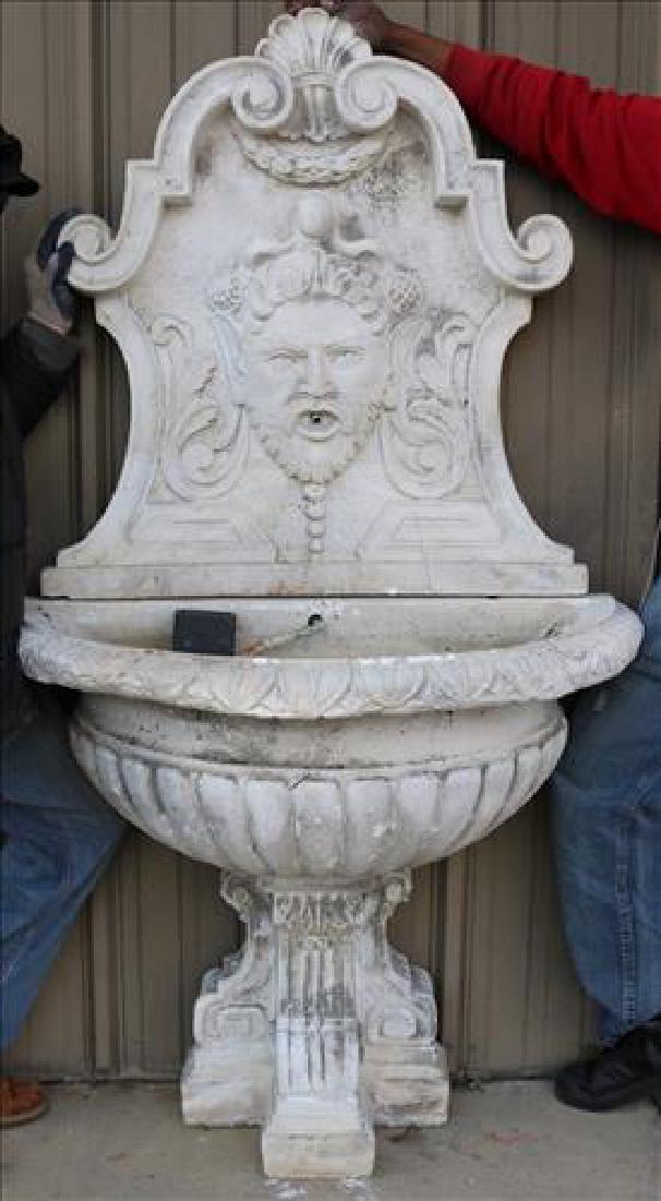 Concrete 2 part wall fountain with face blowing water (1 of 4)