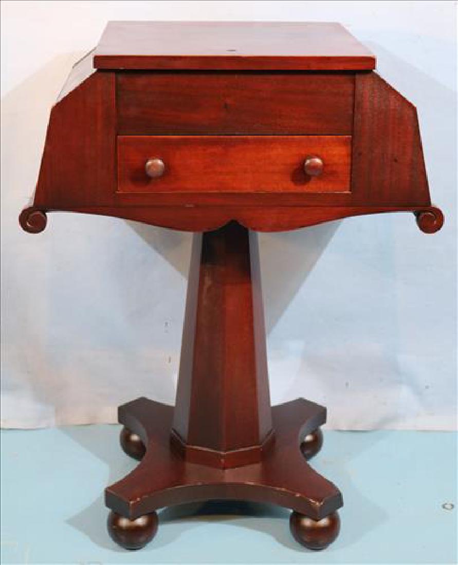 Unusual mahogany Empire sewing table
