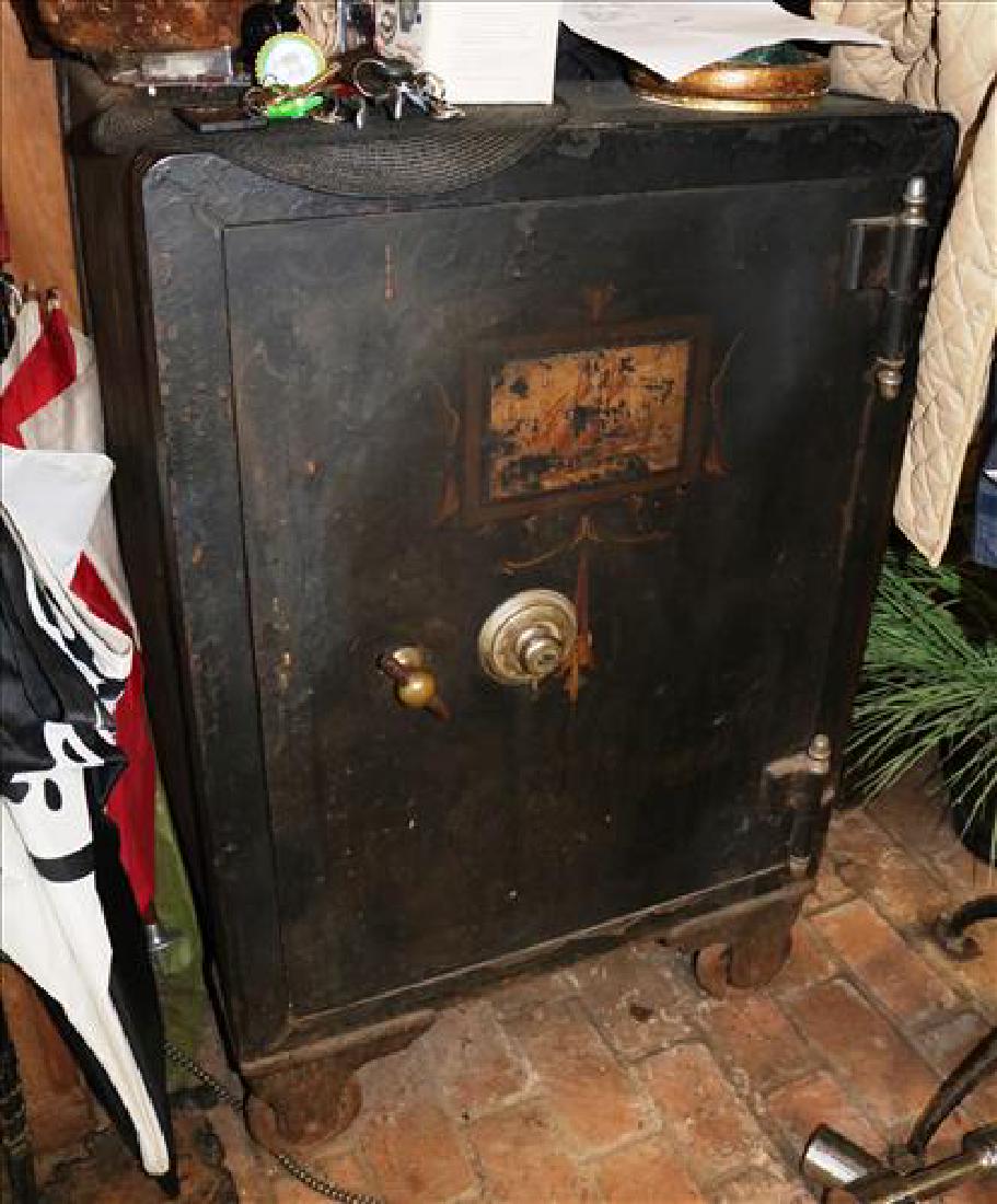 Old family safe, combination works good, 43 in. T, 28: Old family safe, combination works good, 43 in. T, 28 in. W, 26 in. D.