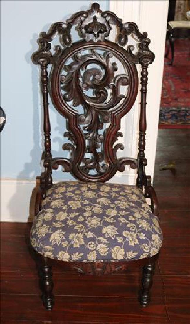Walnut Victorian slipper chair with open pierced back: Walnut Victorian slipper chair with open pierced carved back, 42 in. T, 18 in. W, 17 in. D.