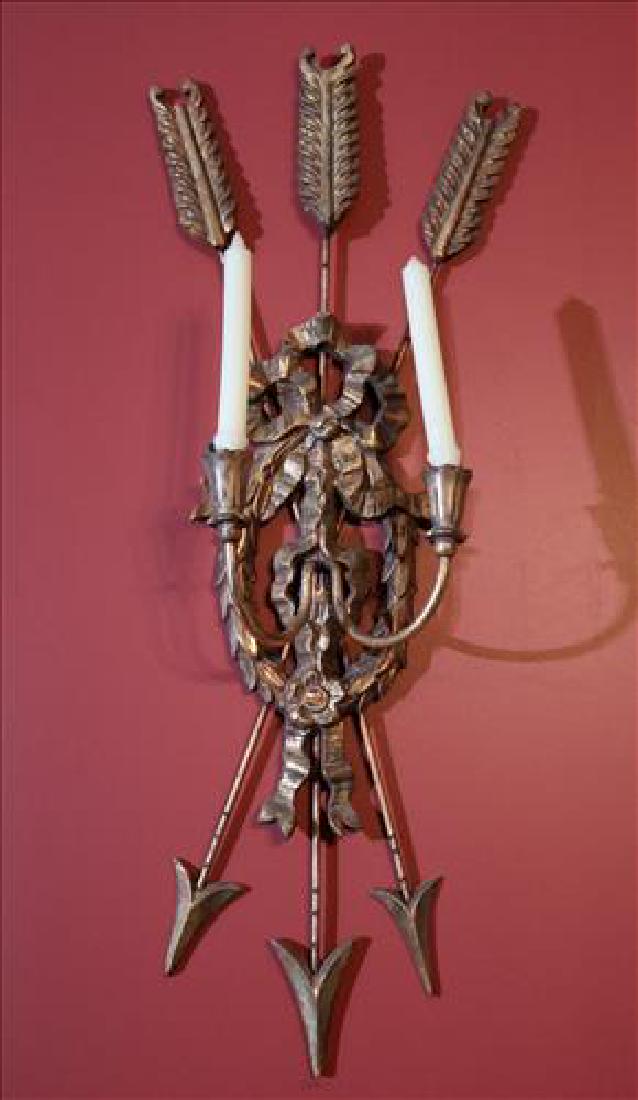 Pair of carved gold gilded wood wall sconces: Pair of carved gold gilded wood wall sconces with metal arrows, 36 in. T.