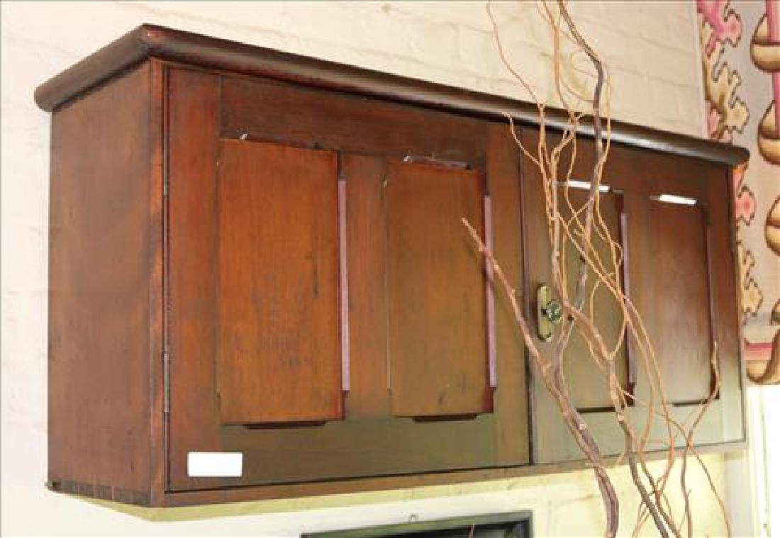 Walnut Victorian hanging wall cabinet, 21 in. T.: Walnut Victorian hanging wall cabinet, 21 in. T, 46 in. W, 12 in. D.