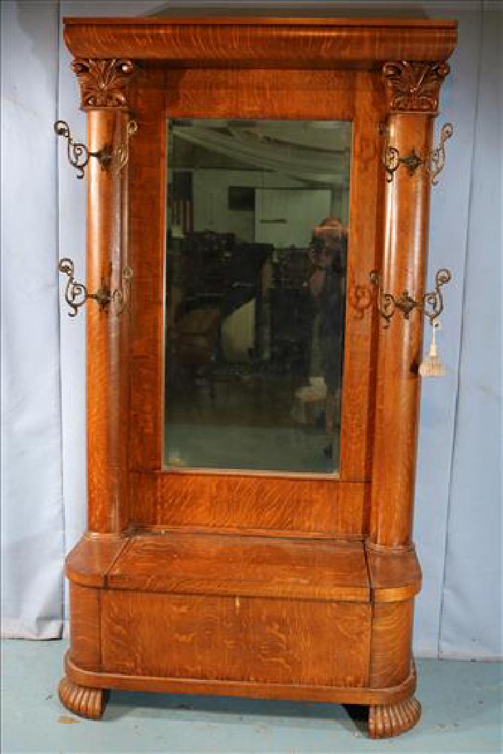 Oak hall tree with big post and lift seat: Oak hall tree with big post and lift seat, all original, 82 in. T, 44 in. W, 20 in. D.