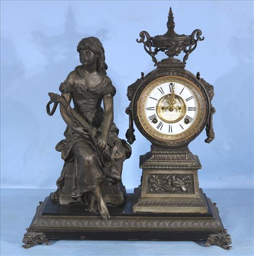 Early Ansonia figural mantle clock w pendulum: Early Ansonia figural mantle clock w pendulum and key, 21 in. T, 18 in W, 8 in D.