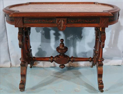 Walnut aesthetic movement center table: Walnut aesthetic movement center table with brown marble, 31 in. T, 42 in. W, 25 in. D.