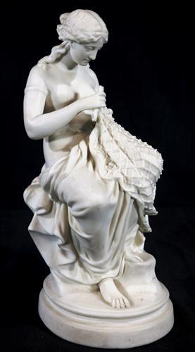 Parian figure of woman sewing, 12 in. T.: Parian figure of woman sewing, has tiny chip, 12 in. T.