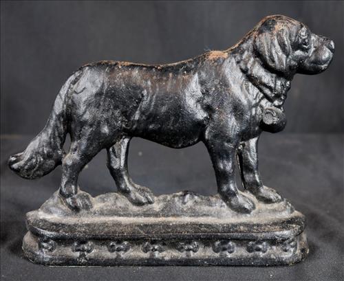 Black cast iron door stop of dog, 7 in. T, 9 in. W.: Black cast iron door stop of dog, 7 in. T, 9 in. W.