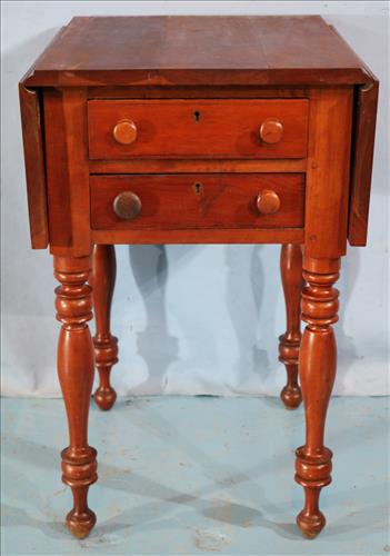 Empire cherry 2 drawer drop leaf work table: Empire cherry 2 drawer drop leaf work table with turn legs, 29 in. T, 18 in. W, 22 in. D.