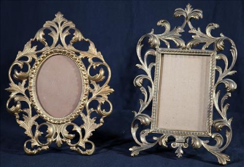 Pair of Victorian metal picture frames: Pair of Victorian metal picture frames, 12 in. T, 8 in. W.