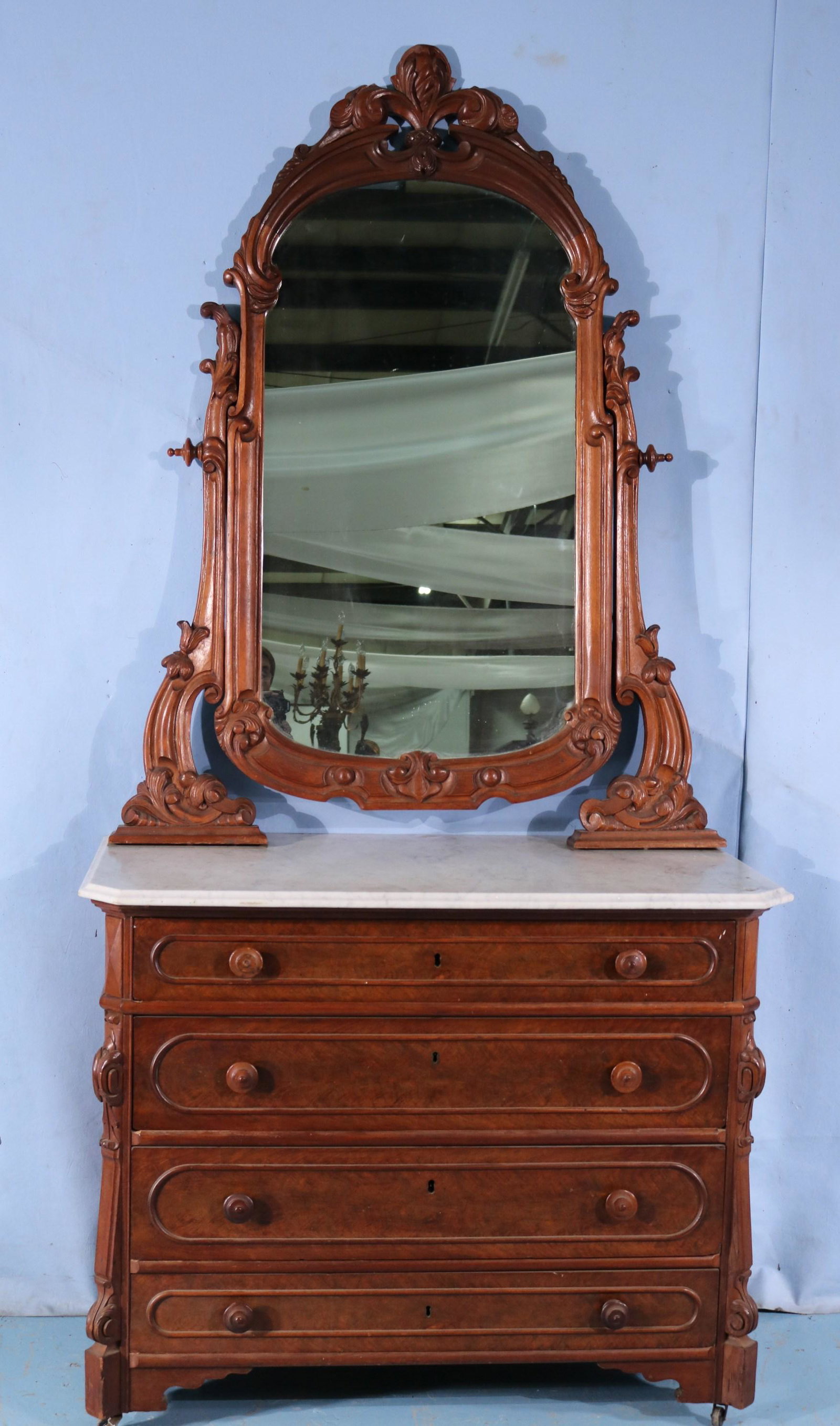 Walnut rococo marble top dresser w 4 drawers: Walnut rococo marble top dresser with 4 drawers, carved mirror and burl trim, 90 in. T, 43 in. W, 23 in. D.