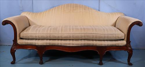 Sofa in the Irish Georgian camel back style: Early 20th Century camel back sofa, Irish Georgian style with carved legs and goose down cushion, 35 in. T, 83 in L, 20 in. D.