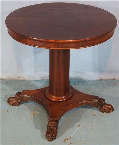 Mahogany Empire round pedestal table with claw feet. (1 of 3)