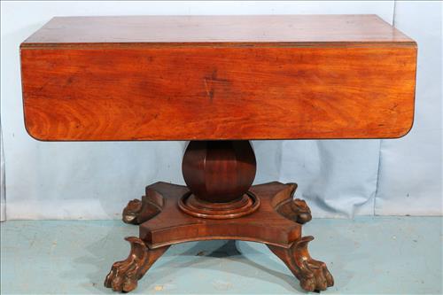 Empire drop leaf breakfast table: Empire drop leaf breakfast table with large pumpkin base and claw feet, 42 in. L, 30 in. T, 20 in. D.