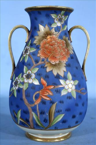 Blue porcelain Victorian vase with handles: Blue porcelain Victorian vase with double handles, applied flowers and gold paint,10 in. T, signed hand painted Nippon