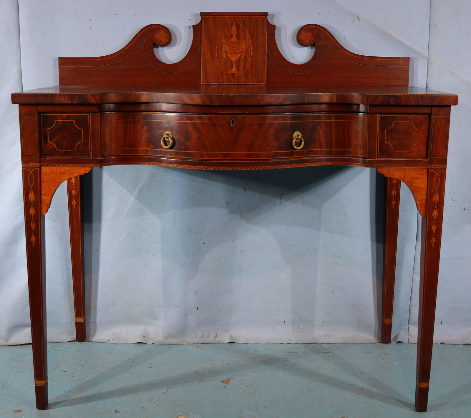 Mahogany Hepplewhite server with inlay: Mahogany Hepplewhite server with inlay, backsplash and tapered legs, 46 in. T, 46 in. W, 21.5 in. D.