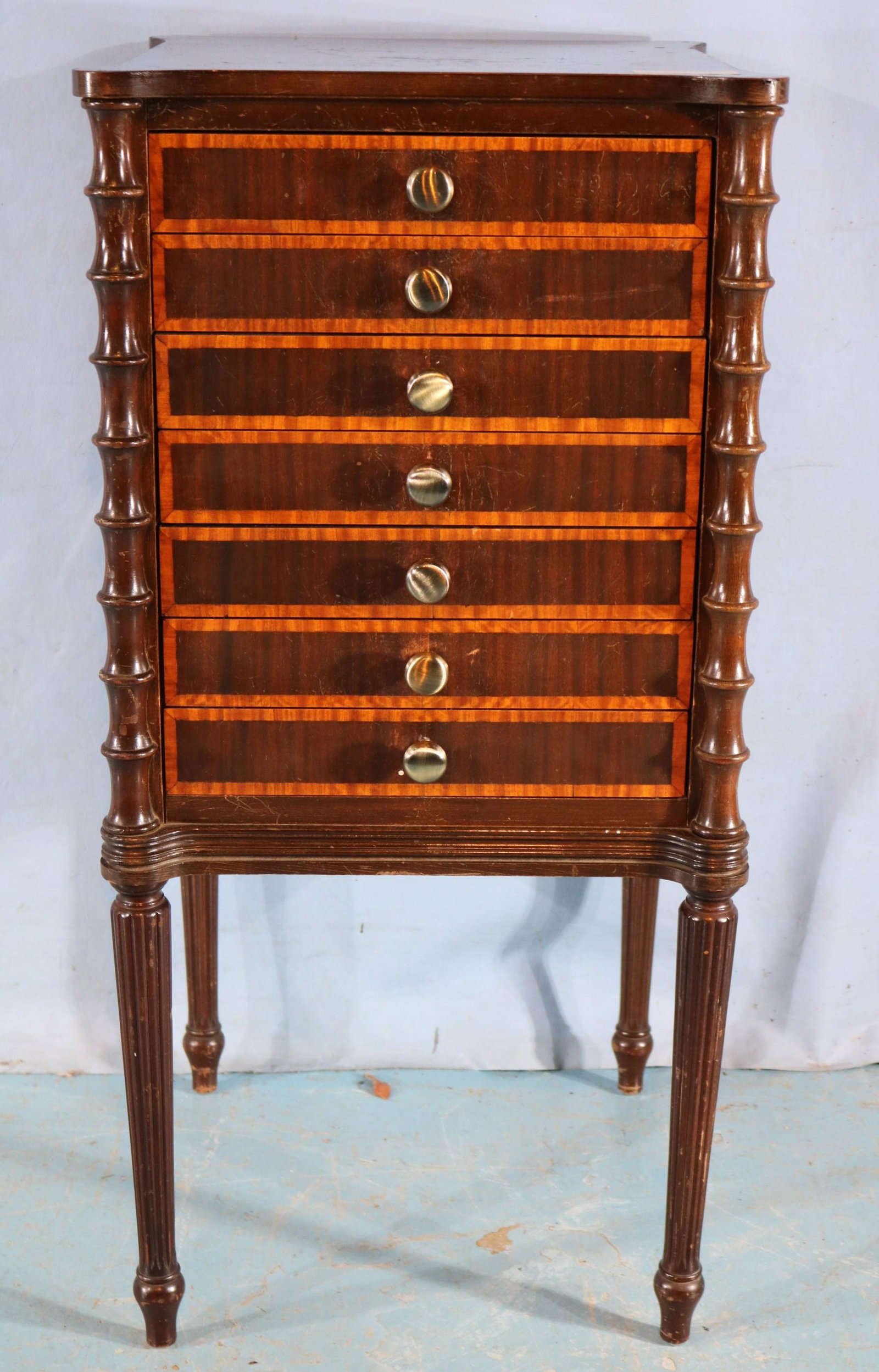 Mahogany sheet music cabinet with inlay: Mahogany sheet music cabinet with inlay on front, 7 drawers and tall legs, 37 in. T, 18 in Sq.