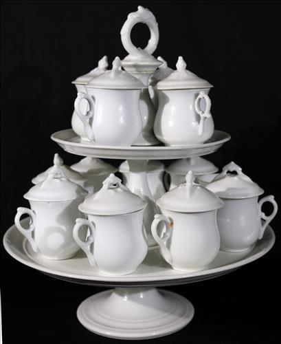 26 piece white porcelain Pots de CrÃ¨me set: 26 piece white porcelain Pots de CrÃ¨me set, Ms. Stark purchased in 1946 with original documents, 14 in. T.