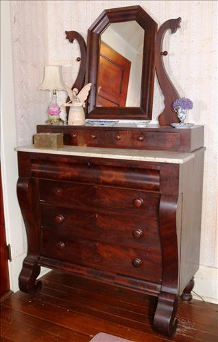 Mahogany Empire dresser w marble insert: Mahogany Empire dresser with marble insert, glove box and scroll feet, from family sugar plantation in LA, 75.5 in. T, 20 in. D, 43.5 in. W.