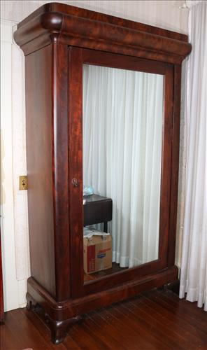 Period flame mahogany linen press: Period flame mahogany linen press with large dressing mirror, 51 in. W, 88.5 in. T, 19.5 in. D.