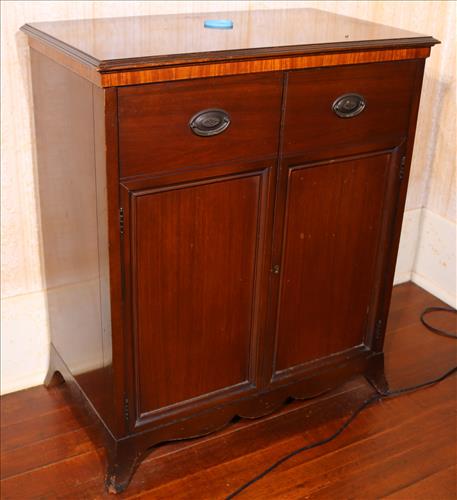 Magnavox Mahogany record cabinet: Magnavox mahogany record cabinet full of Victrola records, 29 in. W, 34 in T, 17 in. D.
