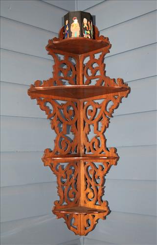 Pierce carved walnut corner what not shelf: Pierce carved walnut Victorian corner what not shelf, 38 in. T, 15 in. W, 12 in. D.