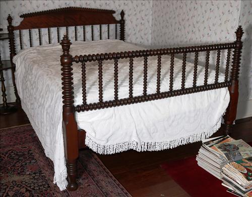 Full size walnut Victorian spool bed: Full size walnut Victorian spool bed, 43 in. T, 72 in. L, 54 in. W.