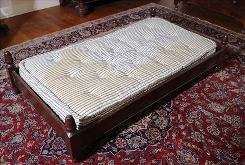 Walnut Victorian trundle bed, 15 in. T. 59 in. L.: Walnut Victorian trundle bed, 15 in. T. 59 in. L, 32.5 in. W.