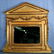 Contemporary gold over the mantle mirror with carvings