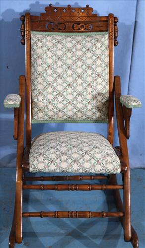 Walnut Victorian folding rocker: Walnut Victorian folding rocker, 34.5 in. T, 21.5 in. W, 14 in. D.