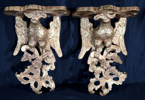 Pair gold gilded wall brackets with eagle: Pair gold gilded wall brackets with eagle, 12.5 in. T, 9.5 in. W, 7.5 in. D.
