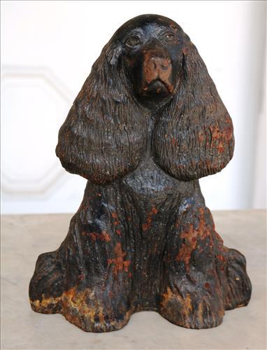 Cast iron poodle door stop: Cast iron poodle door stop, 5 in. T, 7 in. W.